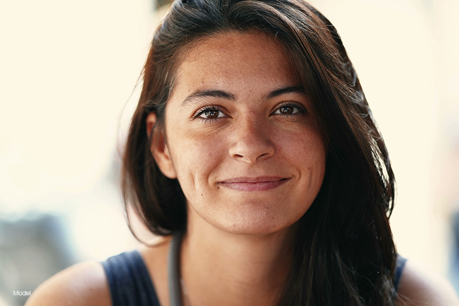 Woman outside smiling